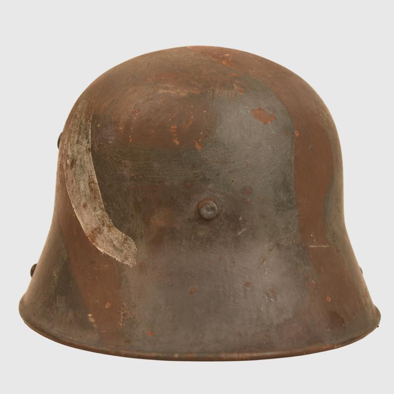 GERMAN WWI M.16 CAMOUFLAGE TRENCH HELMET.