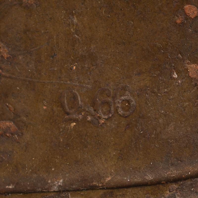 GERMAN WWI M.16 CAMOUFLAGE TRENCH HELMET.