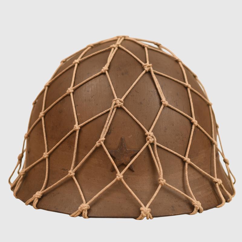 JAPANESE WWII TYPE 90 ARMY COMBAT HELMET WITH NET COVER.
