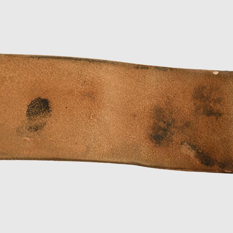 GERMAN WWI SWORD HANGER AND STRAP.