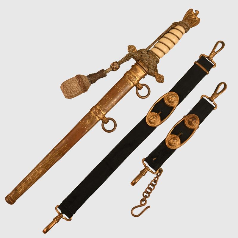 GERMAN WWII KRIEGSMARINE OFFICERS DAGGER TO A GERMAN CROSS IN GOLD AND U-BOAT OFFICER.