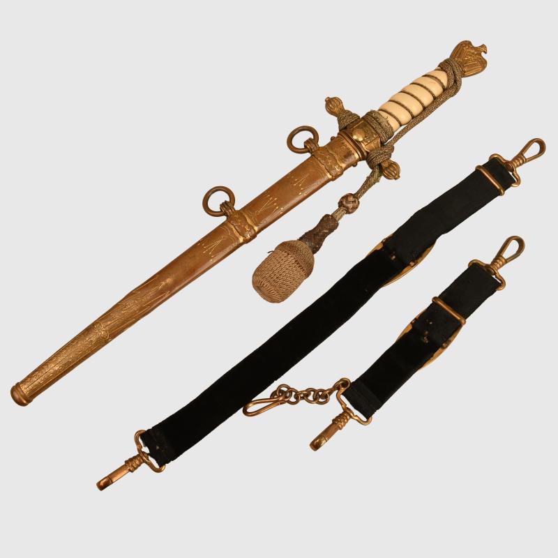 GERMAN WWII KRIEGSMARINE OFFICERS DAGGER TO A GERMAN CROSS IN GOLD AND U-BOAT OFFICER.