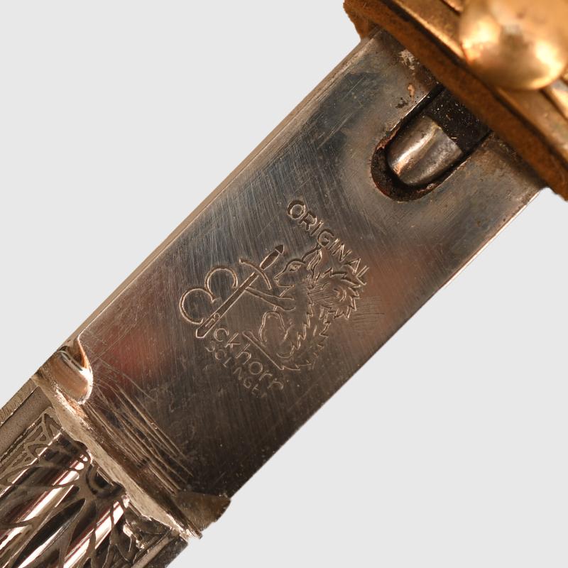 GERMAN WWII KRIEGSMARINE OFFICERS DAGGER TO A GERMAN CROSS IN GOLD AND U-BOAT OFFICER.