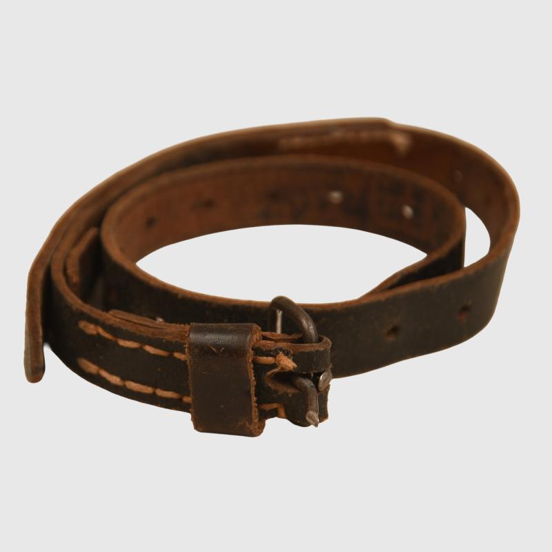 GERMAN WWII WATER BOTTLE STRAP. INK 1941 DATED TO STRAP.