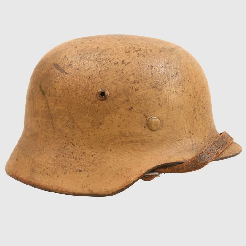 GERMAN WWII A MAGNIFICENT TROPICAL M.35 COMBAT HELMET.