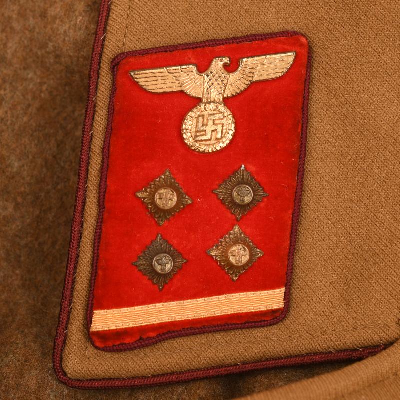 GERMAN WWII NSDAP OBER-GEMEINSCHAFTSLEITER (SENIOR COMMUNITY LEADER) GAU LEVEL OVERCOAT.