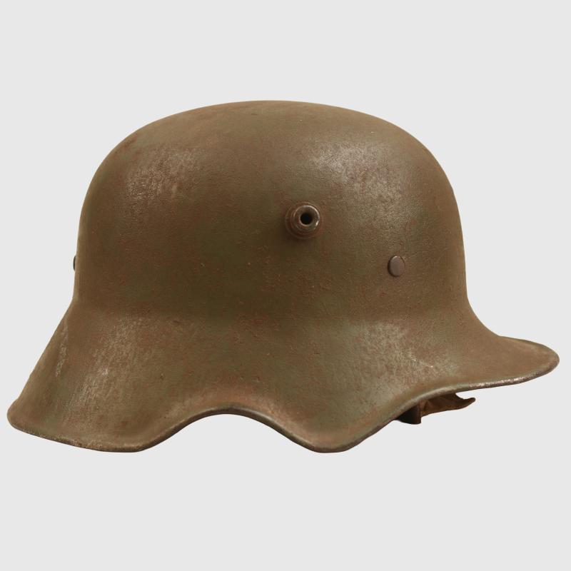 GERMAN WWI M.18 CUT OUT HELMET WITH REMAINS OF FLOCK FINISH.