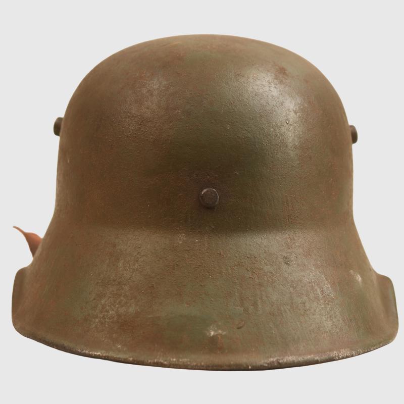 GERMAN WWI M.18 CUT OUT HELMET WITH REMAINS OF FLOCK FINISH.