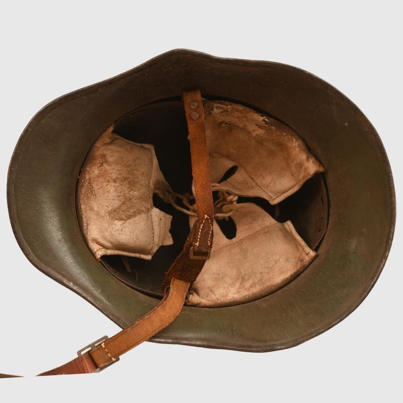 GERMAN WWI M.18 CUT OUT HELMET WITH REMAINS OF FLOCK FINISH.