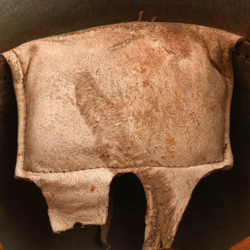GERMAN WWI M.18 CUT OUT HELMET WITH REMAINS OF FLOCK FINISH.