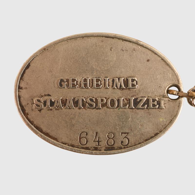 GERMAN WWII GEHEINE STAATSPOLIZEI (GESTAPO) WARRANT DISC.