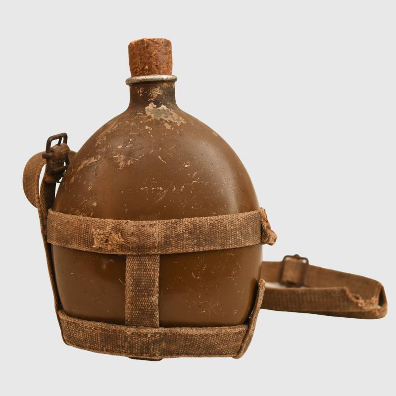 JAPANESE ARMY WATER BOTTLE, BATTLE DAMAGED.