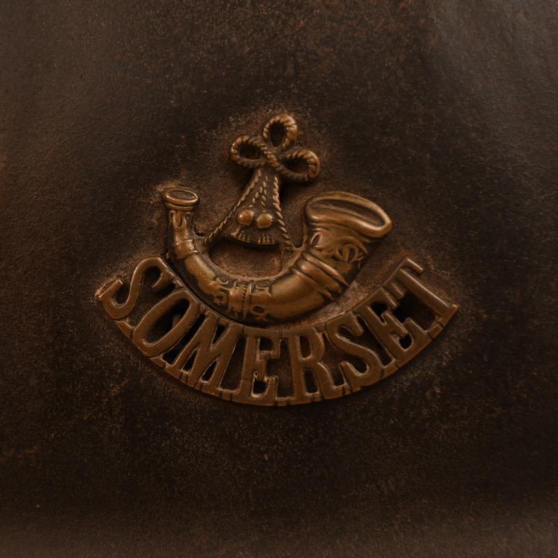 BRITISH WWI SOMERSET LIGHT INFANTRY SOUVENIR HELMET.