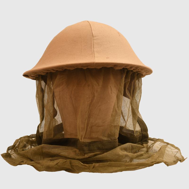 BRITISH WWII 1940 DATED BRODIE HELMET WITH COVER AND MOSQUITO NET.