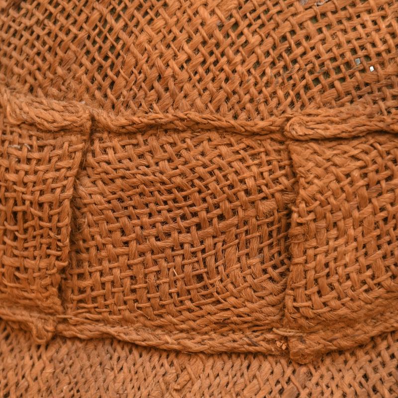 BRITISH WWI 1ST PATTERN BRODIE HELMET WITH A RARE TYPE OF SACKING COVER.