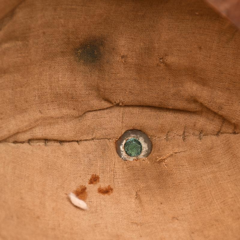 BRITISH WWI 1ST PATTERN BRODIE HELMET WITH A RARE TYPE OF SACKING COVER.
