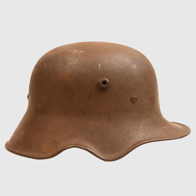 GERMAN WWI M.18 EAR CUT OUT HELMET.