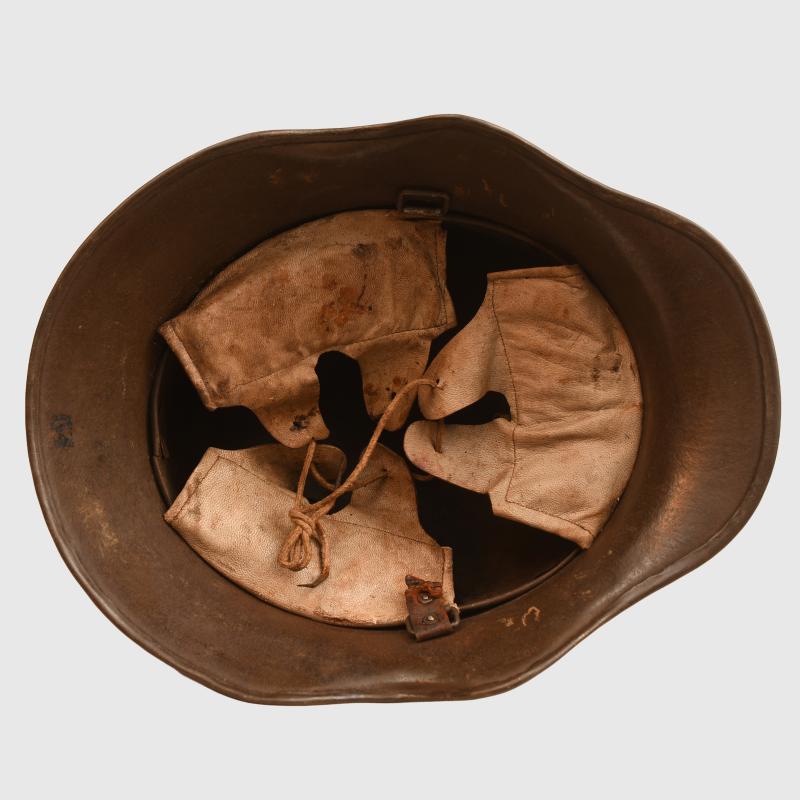 GERMAN WWI M.18 EAR CUT OUT HELMET.