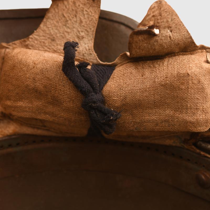GERMAN WWI M.18 EAR CUT OUT HELMET.