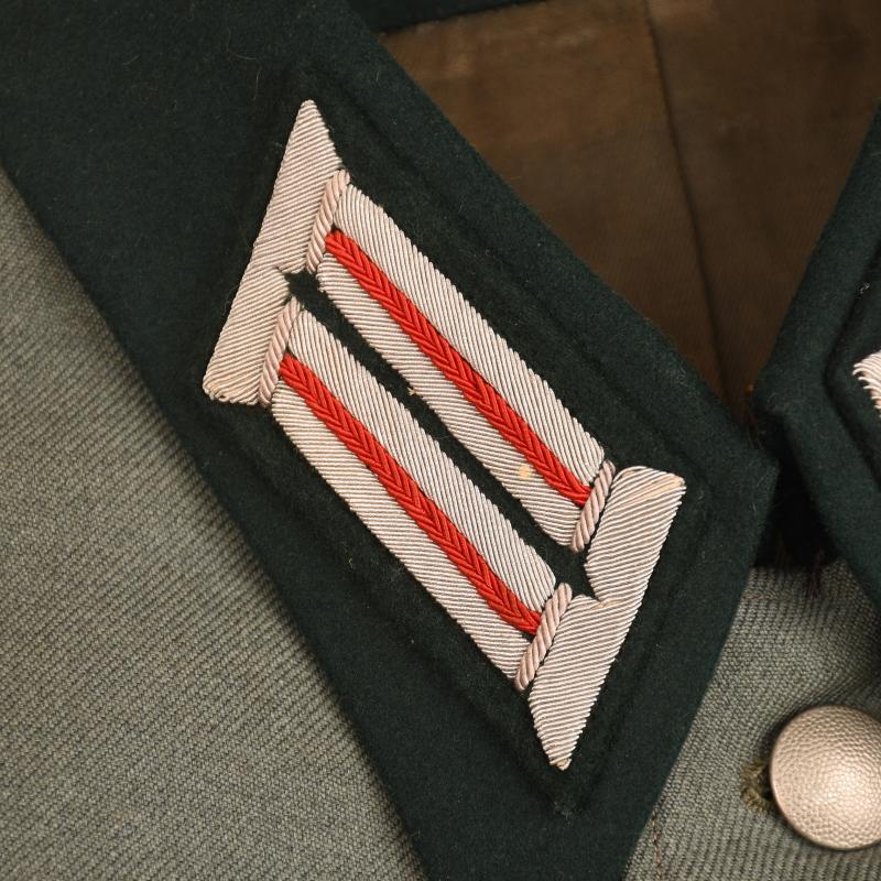 GERMAN WWII ARTILLERY OFFICERS COMBAT TUNIC WITH KRETA CUFF TITLE.