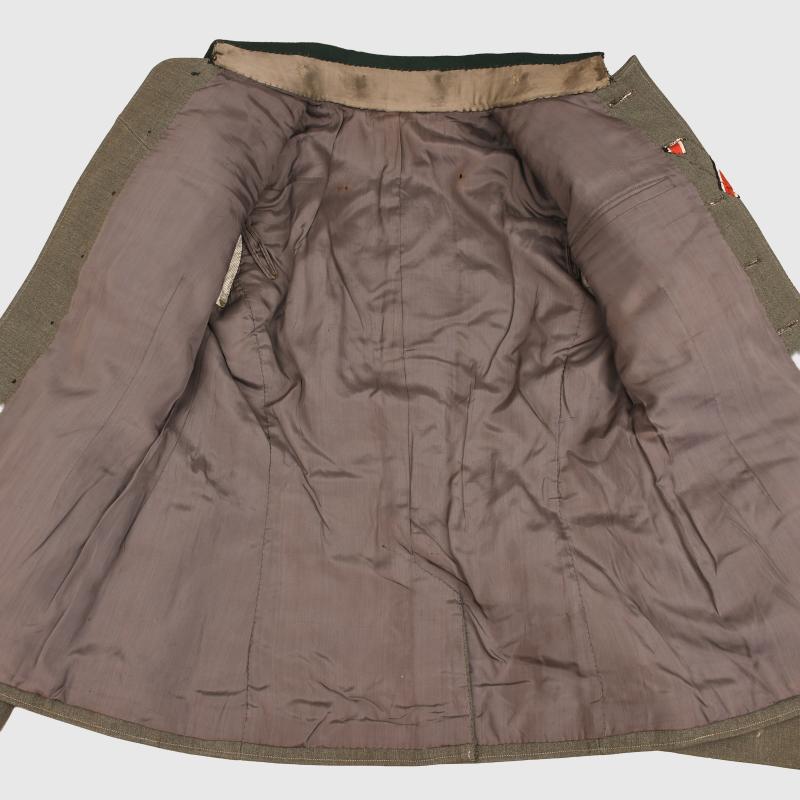 GERMAN WWII ARTILLERY OFFICERS COMBAT TUNIC WITH KRETA CUFF TITLE.