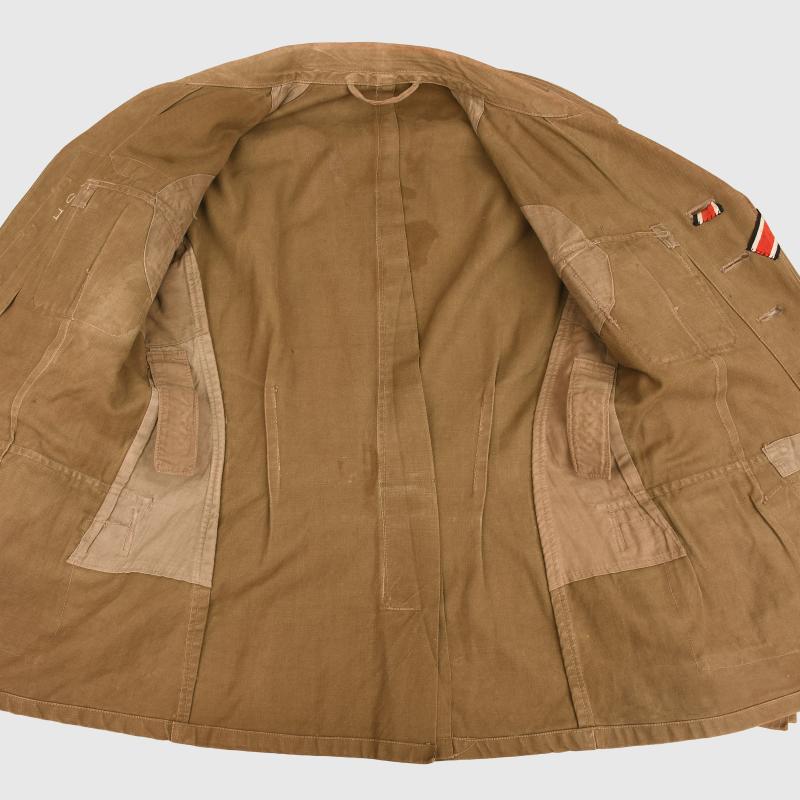 GERMAN WWII 1st PATTERN AFRIKAKORPS ENLISTED MAN’S TUNIC COMBAT WORN.
