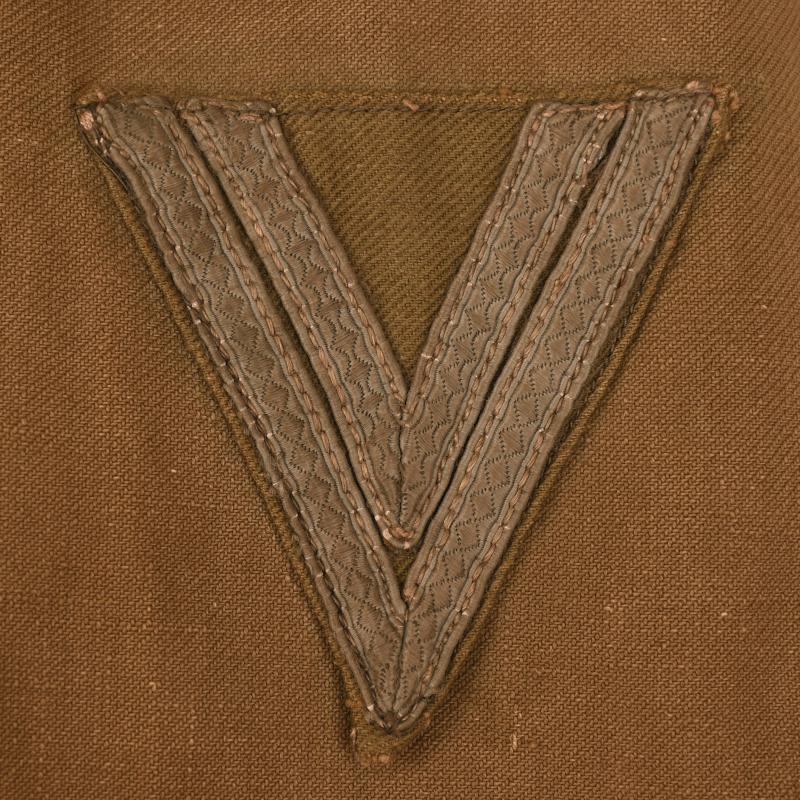 GERMAN WWII 1st PATTERN AFRIKAKORPS ENLISTED MAN’S TUNIC COMBAT WORN.