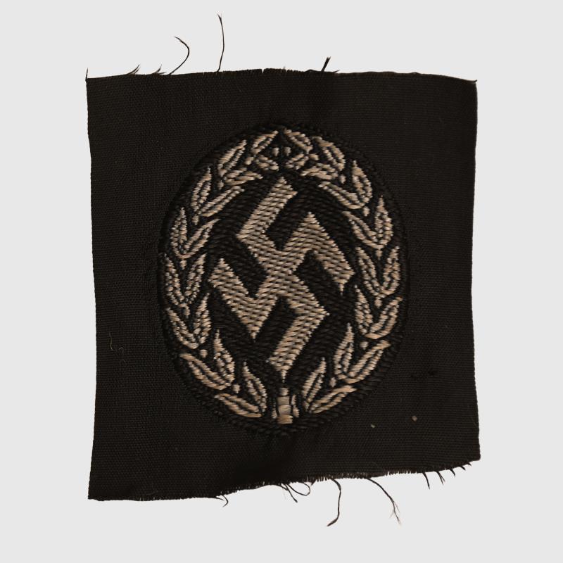 GERMAN WWII UKRAINIAN SCHUTZMANNSCHAFT CAP INSIGNIA.