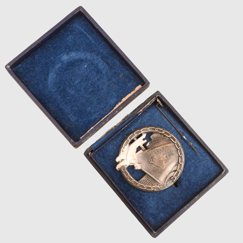 GERMAN WWII KRIEGSMARINE BLOCKADE BREAKER BADGE AND MINIATURE CASED.