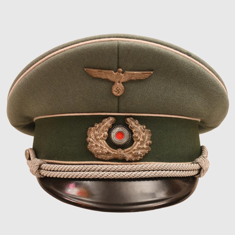 GERMAN WWII COMPLETE INFANTRY HAUPTMANN’S COMBAT TUNIC AND VISOR CAP WITH MEDALS ATTACHED AND BELT.