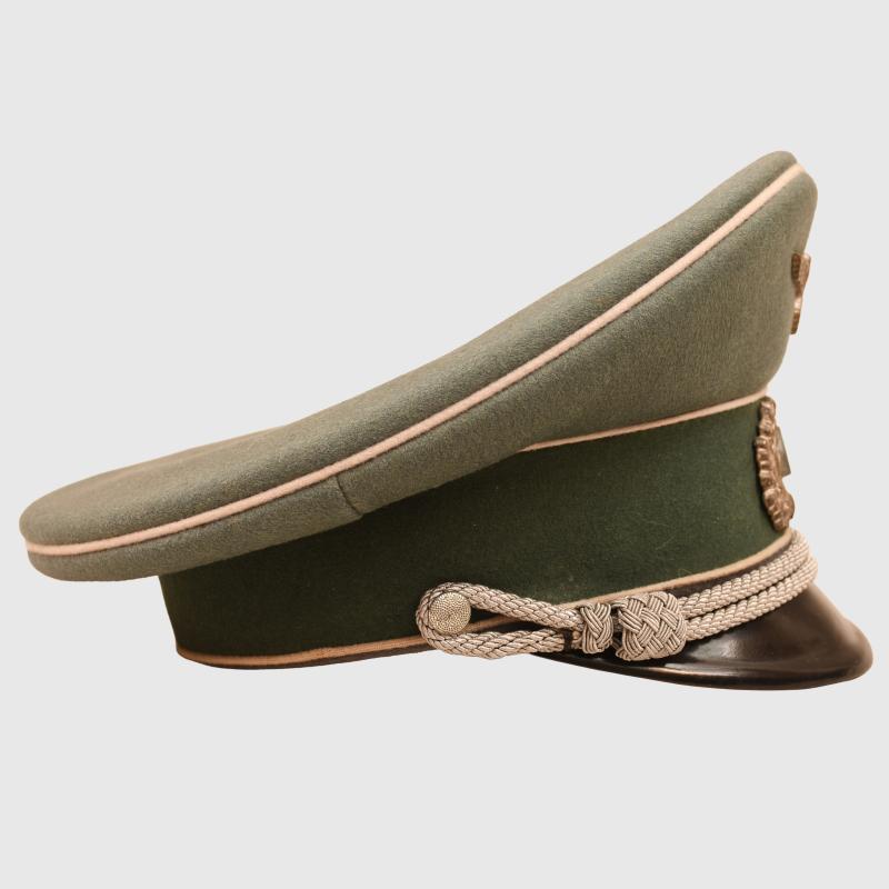 GERMAN WWII COMPLETE INFANTRY HAUPTMANN’S COMBAT TUNIC AND VISOR CAP WITH MEDALS ATTACHED AND BELT.
