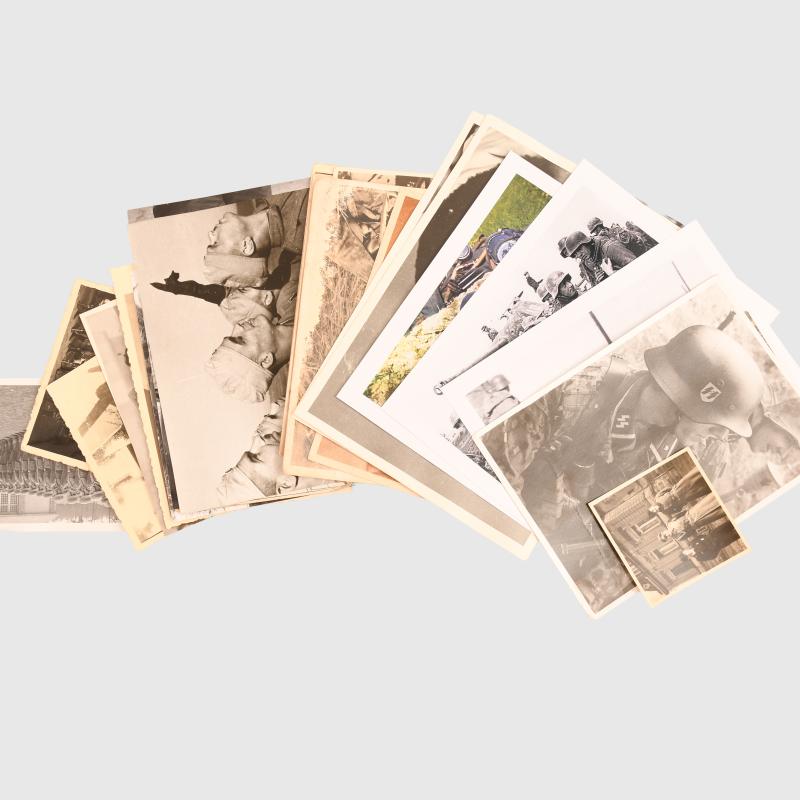 GERMAN WWII 30 PHOTOGRAPHS OF GERMAN ARMY, WAFFEN SS AND LUFTWAFFE TROOPS IN MAINLY COMBAT SITUATIONS.
