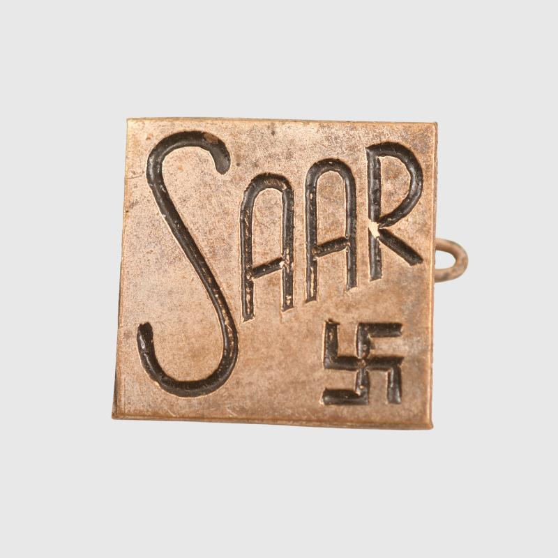 GERMAN WWII SAAR TINNY WITH SWASTIKA.