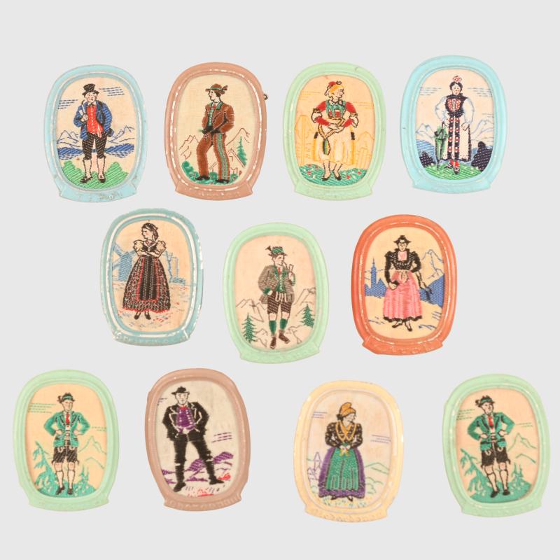 GERMAN WWII 10 EMBROIDERED WINTER HELP WORK BADGES.