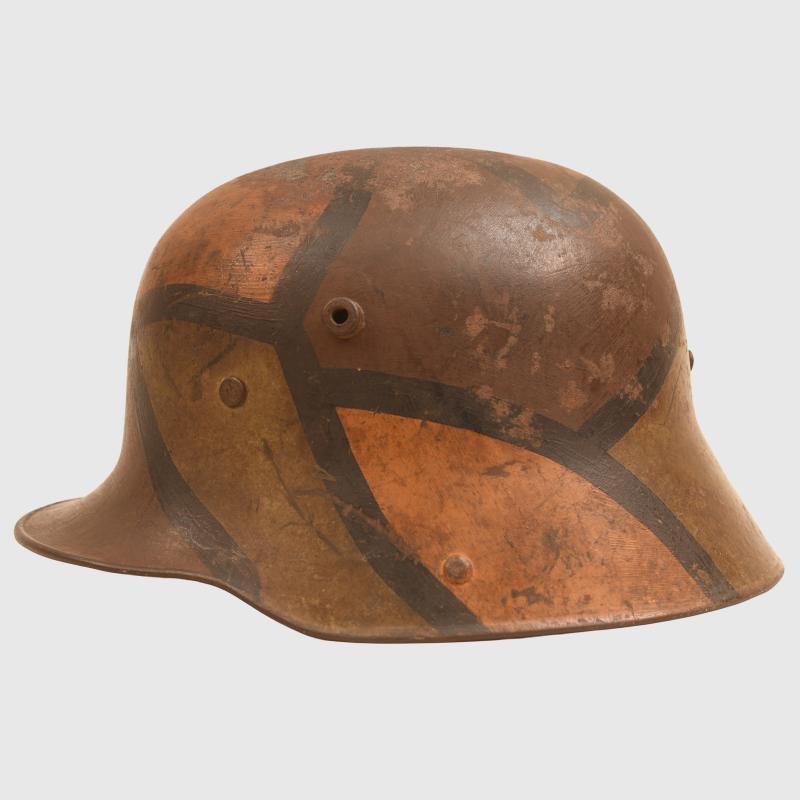 GERMAN WWI M.16 CAMOUFLAGE TRENCH HELMET WITH PARTIAL CHINSTRAP.