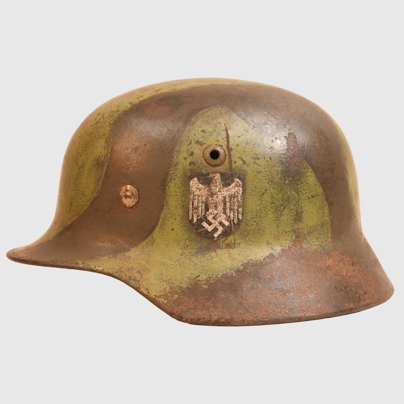 GERMAN WWII ARMY M35 CAMOUFLAGE HELMET.
