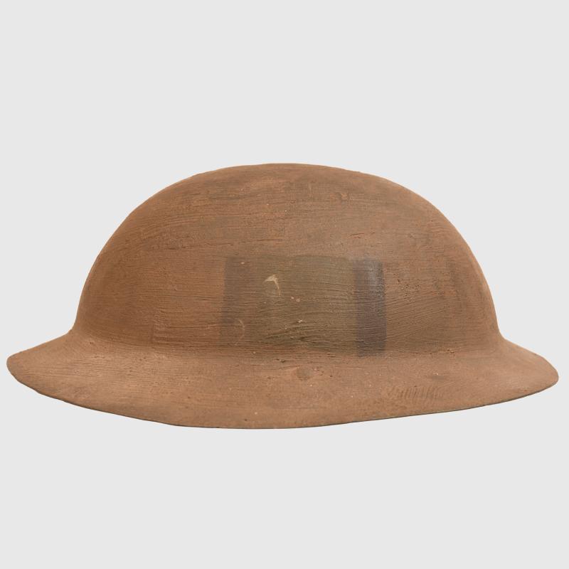 BRITISH WWI VERY EARLY RIMLESS BRODIE HELMET. MARKED TO A RIFLE BRIGADE.
